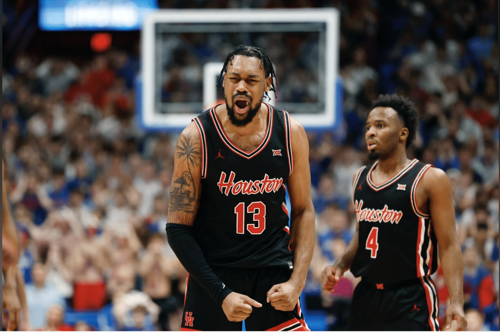 J'Wan Roberts after Houston basketball's win over Kansas (Photo credit: Associated Press AP Photo/Colin E. Braley)